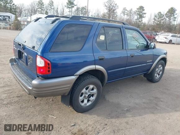 2002 Isuzu Rodeo S with VIN 4S2CK58W324306607, listed as a IAAI auction lot 41466742 with 158,540 mi miles and . Bid and sale history available at DreamBid. Image 4.