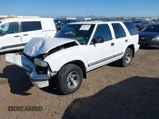 2001 Chevrolet Blazer LT z VIN 1GNCS13W712122865, wystawiony jako IAAI lot #41997035 z przebiegiem 161 862 mil mil oraz . Historia ofert i sprzedaży dostępna na DreamBid. Obrazek 17.