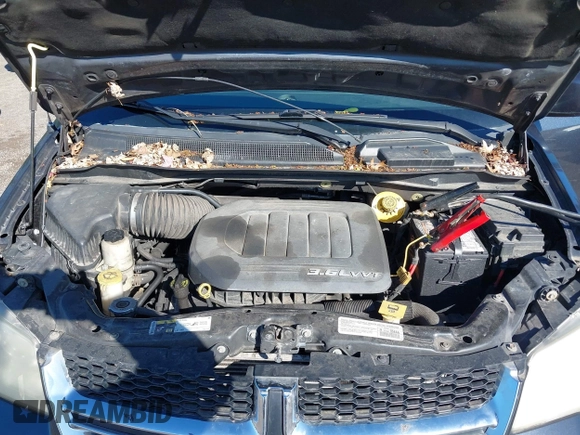 2014 Dodge Grand Caravan SXT with VIN 2C4RDGCG0ER223309, listed as a IAAI auction lot 42161438 with 175,867 mi miles and . Bid and sale history available at DreamBid. Image 10.
