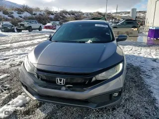 2019 Honda Civic Sedan Sport with VIN 2HGFC2F82KH506102, listed as a Copart auction lot 44227105 with 107,452 mi miles and Salvage Title. Bid and sale history available at carsss.com. Image 12.
