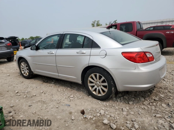 2010 Chrysler Sebring Limited with VIN 1C3CC5FB0AN233881, listed as a Copart auction lot 58819005 with 162,152 mi miles and Non repairable. Bid and sale history available at DreamBid. Image 2.