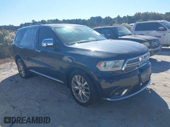 2014 Dodge Durango Citadel with VIN 1C4SDJETXEC390326, listed as a IAAI auction lot 40620779 with 119,537 mi miles and . Bid and sale history available at DreamBid. Image 1.