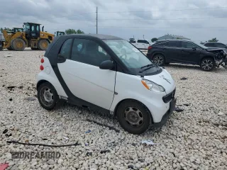 2013 Smart fortwo Pure with VIN WMEEJ3BA1DK633239, listed as a Copart auction lot 54829205 with 147,647 mi miles and Salvage Title. Bid and sale history available at carsss.com. Image 4.