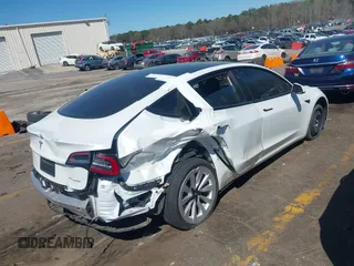 2021 Tesla Model 3 Long Range z VIN 5YJ3E1EB6MF902268, wystawiony jako IAAI lot #41837846 z przebiegiem 37 041 mil mil oraz . Historia ofert i sprzedaży dostępna na DreamBid. Obrazek 4.
