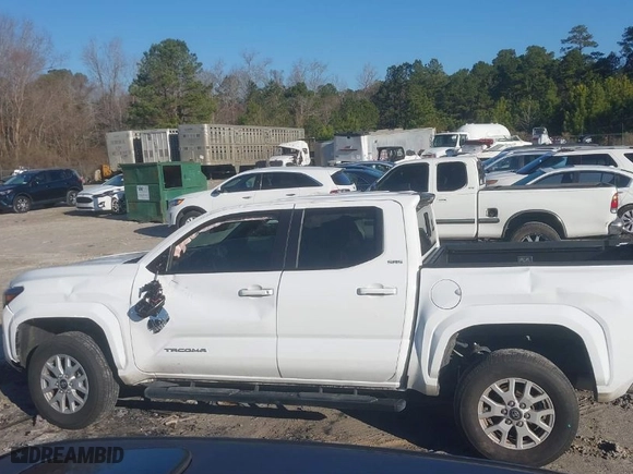 2024 Toyota Tacoma 2WD SR5 with VIN 3TMKB5FN4RM002301, listed as a IAAI auction lot 41489792 with 12,965 mi miles. Bid and sale history available at carsss.com. Image 14.