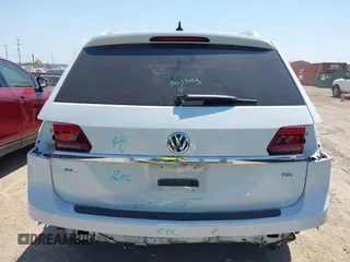 2018 Volkswagen Atlas SE with VIN 1V2CP2CA6JC595282, listed as a IAAI auction lot 42227930 with 95,799 mi miles and . Bid and sale history available at DreamBid. Image 17.
