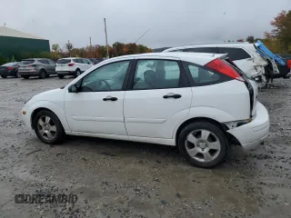 2004 Ford Focus with VIN 3FAFP37Z94R101447, listed as a Copart auction lot 74570054 with 162,166 mi miles and Salvage title. Bid and sale history available at DreamBid. Image 2.