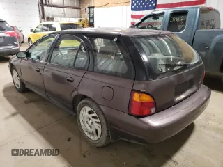 1998 Saturn SW z VIN 1G8ZK8271WZ165967, wystawiony jako Copart lot #73493044 z przebiegiem Nie podano mil oraz Szkody całkowita. Historia ofert i sprzedaży dostępna na DreamBid. Obrazek 2.