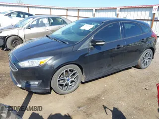 2015 Ford Focus SE with VIN 1FADP3K26FL320689, listed as a IAAI auction lot 42160904 with 95,136 mi miles and . Bid and sale history available at DreamBid. Image 2.