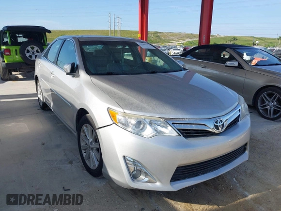 2014 Toyota Camry L with VIN 4T1BF1FK6EU840706, listed as a IAAI auction lot 39109449 with 164,746 mi miles. Bid and sale history available at carsss.com. Image 1.
