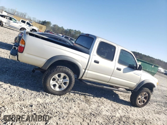 2003 Toyota Tacoma PreRunner z VIN 5TEGM92N33Z215411, wystawiony jako Copart lot #49573225 z przebiegiem 255 517 mil mil oraz Czysty tytuł • Clean title. Historia ofert i sprzedaży dostępna na DreamBid. Obrazek 3.