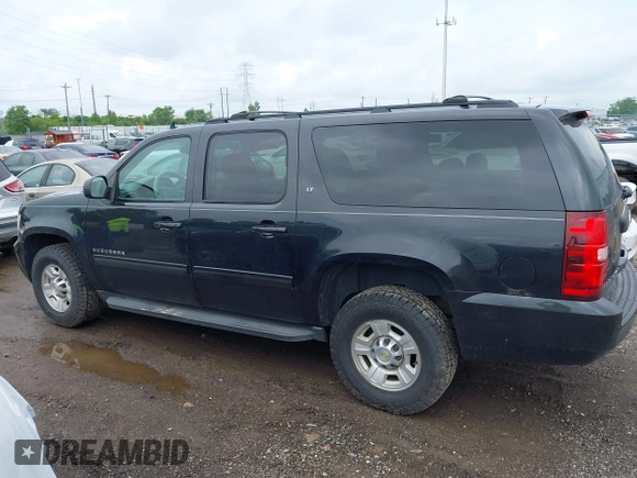 2011 Chevrolet Suburban with VIN 1GNWKMEG1BR374950, listed as a IAAI auction lot 42781182 with 304,690 mi miles and . Bid and sale history available at DreamBid. Image 14.