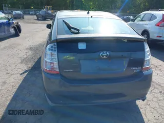 2007 Toyota Prius z VIN JTDKB20U473225645, wystawiony jako IAAI lot #42409516 z przebiegiem 154 050 mil mil oraz . Historia ofert i sprzedaży dostępna na DreamBid. Obrazek 12.
