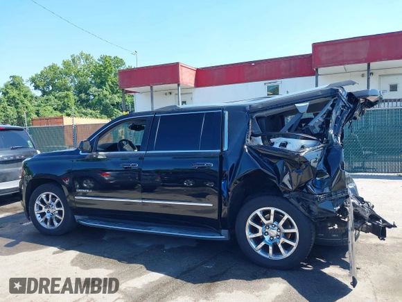 2015 GMC Yukon XL Denali with VIN 1GKS2JKJ9FR244754, listed as a IAAI auction lot 39706952 with 94,917 mi miles. Bid and sale history available at carsss.com. Image 15.