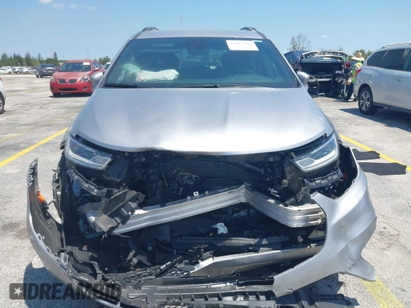2021 Chrysler Pacifica Touring L with VIN 2C4RC1BG3MR591256, listed as a IAAI auction lot 42062406 with 58,117 mi miles and . Bid and sale history available at DreamBid. Image 6.