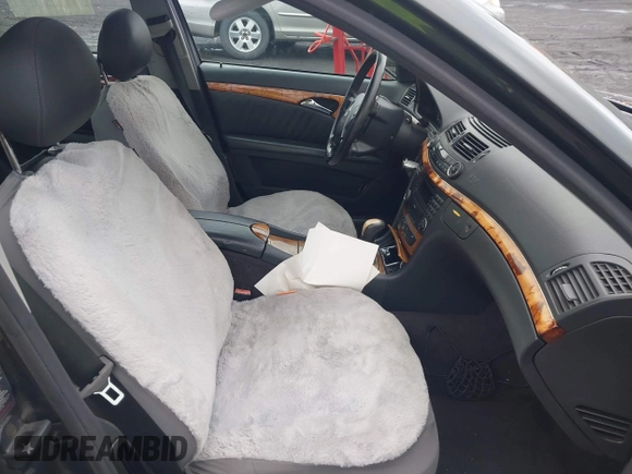 2003 Mercedes-Benz E 500 with VIN WDBUF70J73A189907, listed as a IAAI auction lot 41824651 with 126,466 mi miles and . Bid and sale history available at DreamBid. Image 5.