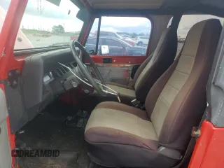 1995 Jeep Wrangler S with VIN 1J4FY19P4SP318216, listed as a Copart auction lot 52751605 with 241,154 mi miles and Salvage title. Bid and sale history available at DreamBid. Image 7.