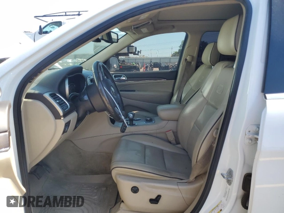 2015 Jeep Grand Cherokee Overland with VIN 1C4RJFCM4FC618516, listed as a Copart auction lot 58671455 with 221,550 mi miles and Clean title. Bid and sale history available at DreamBid. Image 7.