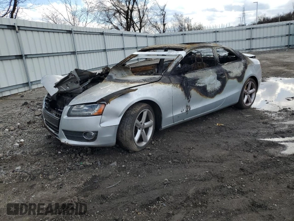 2009 Audi A5 with VIN WAUDK78T09A001754, listed as a Copart auction lot 50574115 with 0 mi miles and Salvage Title. Bid and sale history available at carsss.com. Image 1.
