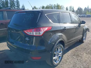 2014 Ford Escape SE with VIN 1FMCU9G9XEUB01861, listed as a IAAI auction lot 42096150 with 141,853 mi miles. Bid and sale history available at carsss.com. Image 4.