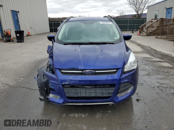 2015 Ford Escape SE with VIN 1FMCU0GX5FUC58323, listed as a Copart auction lot 53029045 with 67,300 mi miles and Salvage Title. Bid and sale history available at carsss.com. Image 5.