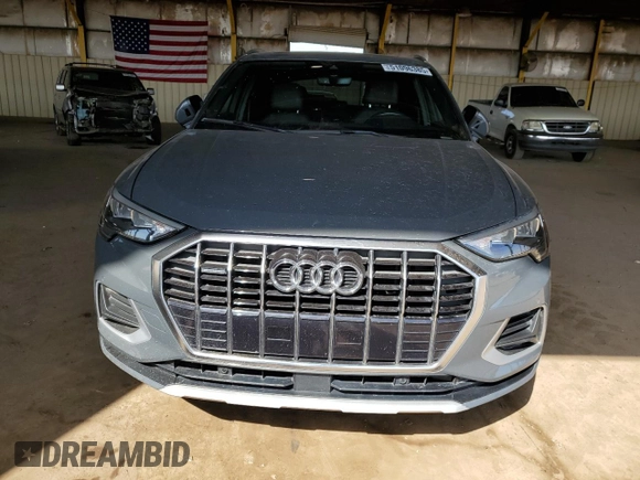 2020 Audi Q3 Premium with VIN WA1AECF34L1034797, listed as a Copart auction lot 51096385 with 74,192 mi miles and Salvage title. Bid and sale history available at DreamBid. Image 5.