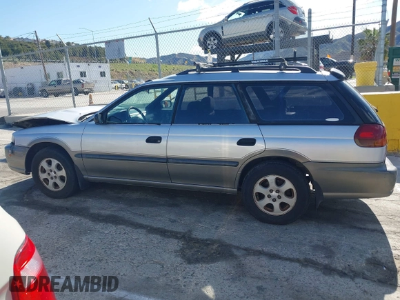 1999 Subaru Legacy Outback z VIN 4S3BG6850X6621723, wystawiony jako IAAI lot #41932992 z przebiegiem 283 200 mil mil oraz . Historia ofert i sprzedaży dostępna na DreamBid. Obrazek 14.