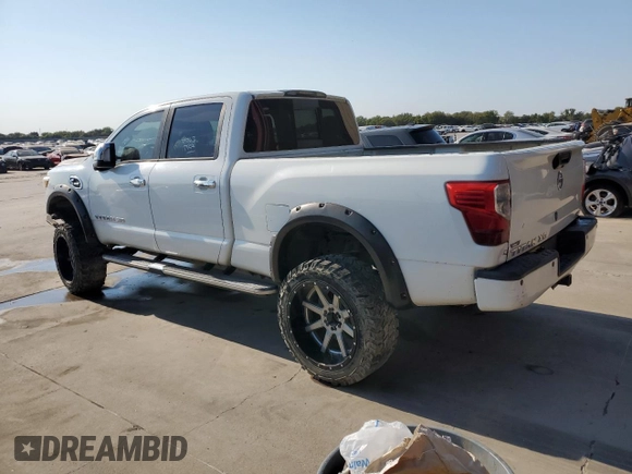 2016 Nissan Titan Platinum Reserve z VIN 1N6BA1F21GN513109, wystawiony jako Copart lot #64840434 z przebiegiem 94 263 mil mil oraz Czysty tytuł • Clean title. Historia ofert i sprzedaży dostępna na DreamBid. Obrazek 2.