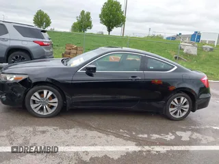 2009 Honda Accord LX-S with VIN 1HGCS12339A010440, listed as a IAAI auction lot 42045025 with 126,767 mi miles and . Bid and sale history available at DreamBid. Image 14.