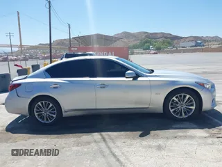 2020 Infiniti Q50 Luxe with VIN JN1EV7AP0LM203949, listed as a IAAI auction lot 42520077 with 57,531 mi miles and . Bid and sale history available at DreamBid. Image 13.