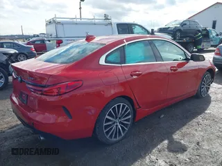 2020 BMW 2 Series 228i xDrive with VIN WBA73AK05L7F66529, listed as a IAAI auction lot 41575774 with 53,647 mi miles. Bid and sale history available at carsss.com. Image 4.