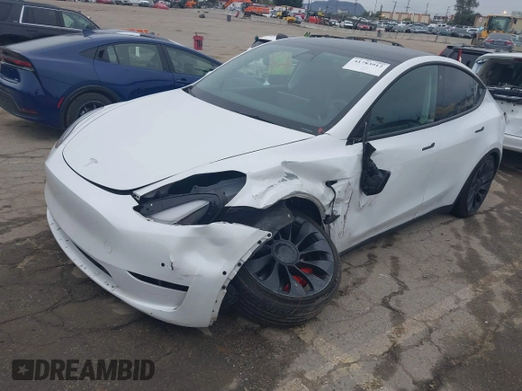 2022 Tesla Model Y Performance with VIN 7SAYGDEF0NF400560, listed as a IAAI auction lot 41783912 with 36,513 mi miles and . Bid and sale history available at DreamBid. Image 20.