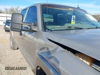 2003 GMC Sierra 1500HD SLE z VIN 1GTGK13U43F230834, wystawiony jako IAAI lot #41281221 z przebiegiem 213 362 mil mil oraz . Historia ofert i sprzedaży dostępna na DreamBid. Obrazek 1.