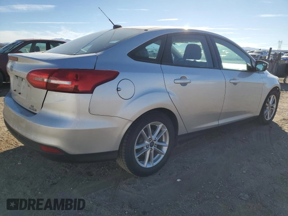 2016 Ford Focus SE with VIN 1FADP3F24GL348258, listed as a Copart auction lot 47851945 with 111,200 mi miles and Salvage Title. Bid and sale history available at DreamBid. Image 3.