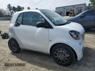 2016 Smart fortwo Passion z VIN WMEFJ5DAXGK123943, wystawiony jako Copart lot #51904865 z przebiegiem 69 821 mil mil oraz Szkody całkowita. Historia ofert i sprzedaży dostępna na DreamBid. Obrazek 4.