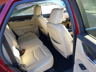 2018 Cadillac XT5 FWD with VIN 1GYKNARS4JZ211455, listed as a IAAI auction lot 41257536 with 102,032 mi miles and . Bid and sale history available at DreamBid. Image 8.