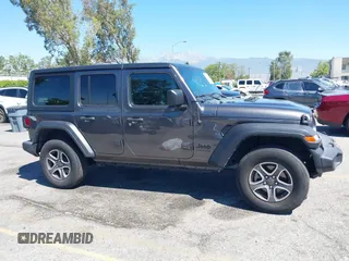 2022 Jeep Wrangler Unlimited Sport S z VIN 1C4HJXDG6NW134306, wystawiony jako IAAI lot #42206796 z przebiegiem 45 303 mil mil oraz . Historia ofert i sprzedaży dostępna na DreamBid. Obrazek 13.