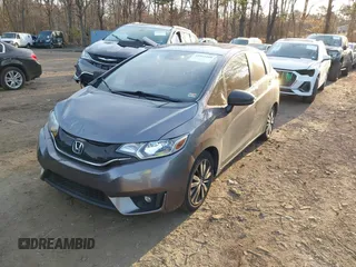 2017 Honda Fit EX with VIN 3HGGK5G71HM700340, listed as a IAAI auction lot 41911268 with 82,973 mi miles and . Bid and sale history available at DreamBid. Image 2.