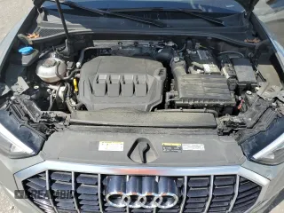 2021 Audi Q3 Premium with VIN WA1AUCF37M1067054, listed as a Copart auction lot 57299815 with 67,334 mi miles and Salvage title. Bid and sale history available at DreamBid. Image 12.