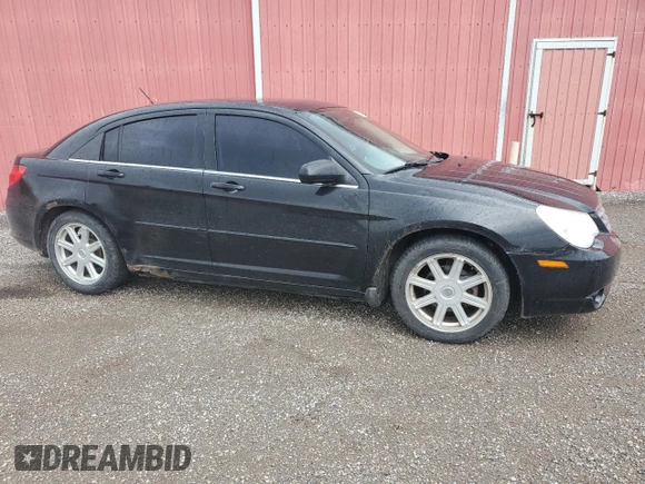 2009 Chrysler Sebring Touring z VIN 1C3LC56D69N570746, wystawiony jako Copart lot #55300405 z przebiegiem 186 391 mil mil oraz Czysty tytuł • Clean title. Historia ofert i sprzedaży dostępna na DreamBid. Obrazek 4.