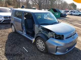 2012 Scion xB with VIN JTLZE4FE1CJ010574, listed as a IAAI auction lot 41858422 with 65,862 mi miles. Bid and sale history available at carsss.com. Image 1.