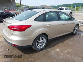 2017 Ford Focus SE with VIN 1FADP3F20HL237823, listed as a IAAI auction lot 39690628 with 104,747 mi miles and . Bid and sale history available at DreamBid. Image 4.
