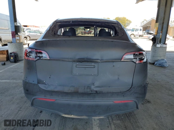 2024 Tesla Model Y Performance z VIN 7SAYGDEFXRF037934, wystawiony jako Copart lot #52126255 z przebiegiem 27 366 mil mil oraz Szkoda całkowita • Salvage title. Historia ofert i sprzedaży dostępna na DreamBid. Obrazek 6.