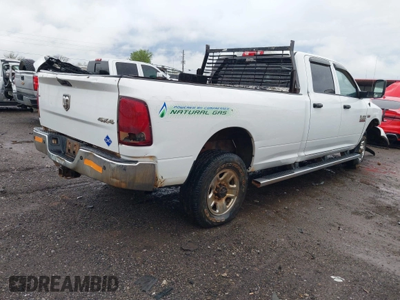 2015 Ram 2500 Tradesman z VIN 3C6TR5H29FG558981, wystawiony jako IAAI lot #41944923 z przebiegiem 262 459 mil mil oraz . Historia ofert i sprzedaży dostępna na DreamBid. Obrazek 4.
