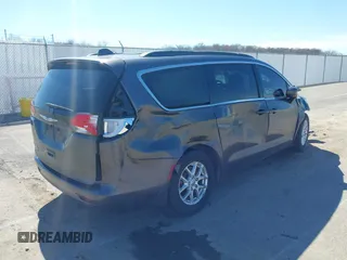 2021 Chrysler Voyager LXi with VIN 2C4RC1DGXMR519600, listed as a IAAI auction lot 41813991 with 87,187 mi miles and . Bid and sale history available at DreamBid. Image 4.