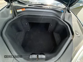 2014 Tesla Model S 60 z VIN 5YJSA1H11EFP44322, wystawiony jako Copart lot #59038135 z przebiegiem 146 015 mil mil oraz Czysty tytuł • Clean title. Historia ofert i sprzedaży dostępna na DreamBid. Obrazek 7.