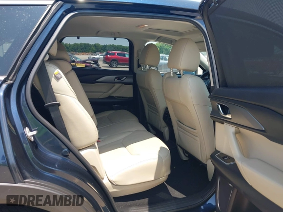 2018 Mazda CX-9 Touring with VIN JM3TCBCY3J0220372, listed as a IAAI auction lot 42405192 with 104,556 mi miles and . Bid and sale history available at DreamBid. Image 8.