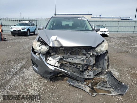 2014 Mazda CX-5 Sport with VIN JM3KE2BE2E0318246, listed as a Copart auction lot 50785935 with 235,475 mi miles and Salvage Title. Bid and sale history available at carsss.com. Image 5.