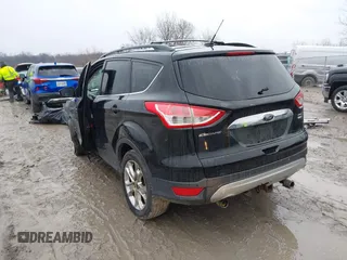 2013 Ford Escape SEL with VIN 1FMCU9H90DUA77972, listed as a IAAI auction lot 41984889 with 206,265 mi miles. Bid and sale history available at carsss.com. Image 3.