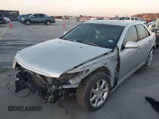 2011 Cadillac STS RWD w/1SB with VIN 1G6DW6ED8B0145873, listed as a IAAI auction lot 41104393 with 212,743 mi miles. Bid and sale history available at carsss.com. Image 2.